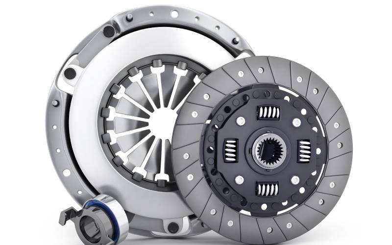 An automotive clutch disc and cover are displayed together vertically and isolated against a white background.