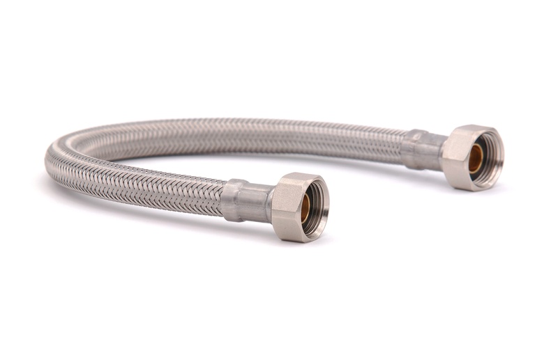 A stainless steel braided hose connector line showing the connection points isolated against a white background.